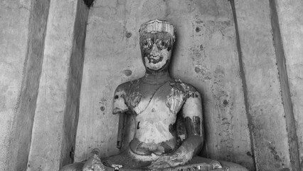 A broken statue of a Buddha in Wat Chaiwatthanaram Temple in Ayutthaya.