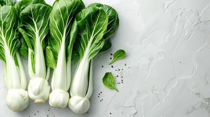 Organic fresh bok choy or pak choy in a white surface with a big space for text or product and a top view, Generative AI. - obrazy, fototapety, plakaty