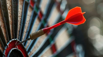 Tuinposter A meticulously directed crimson dart hits its target dead center, showcasing flawless precision and triumphant accuracy in hitting the mark © HillTract