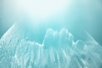 White shiny glare from sunlight on blue background, abstract nature seascape photo with sunshine...