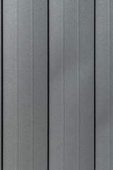 Texture of black metal standing seam facade. Minimalist building exterior design. Metal wall rebated panels as background - 752698690