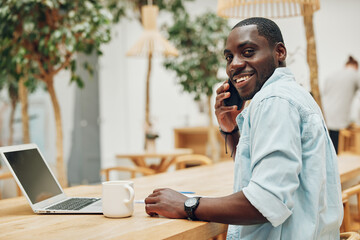 Happy man business phone technology male communication smartphone sitting person lifestyle talking young smile - Powered by Adobe