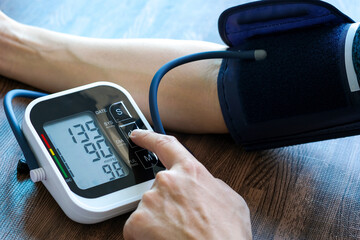 Doctor woman check blood pressure monitor and heart rate monitor pressure gauge. Health care and...