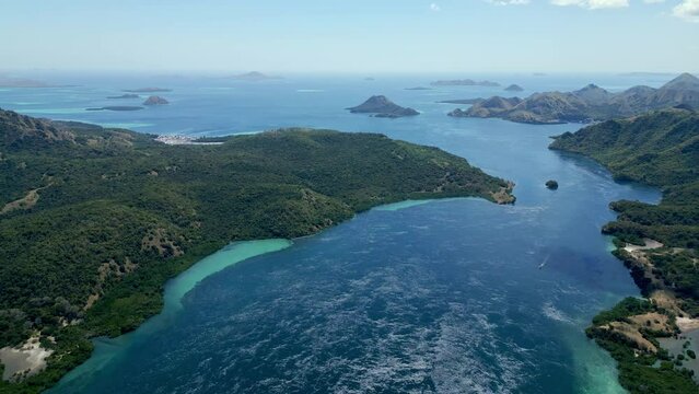Aerial View of Sea Landscape of Blue Water and Mountain Ocean Coast. Traveling in Atlantic Nature of Rocky Island Seashore. Above Shot of Wild Seacoast with Big Forest Land and Azure Marine Lagoons