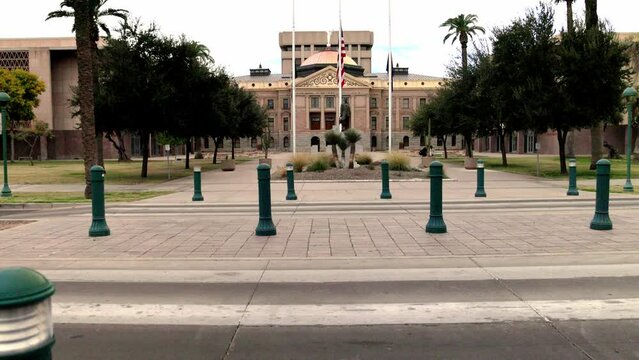 Arizona state capitol building in Phoenix, Arizona with wide shot tilting up.