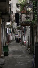 Fototapeta premium Asian empty back alley street covered with balconies