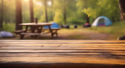 Foto op Plexiglas wooden table on blurred camping background © Amir Bajric
