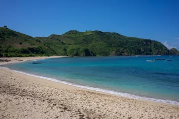 Foto op Canvas Pristine Mawun Beach in Lombok, Indonesia, Showcasing Unspoiled Sandy Shore and Crystal Clear Waters © Mirador