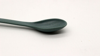 Plastic gray spoon isolated