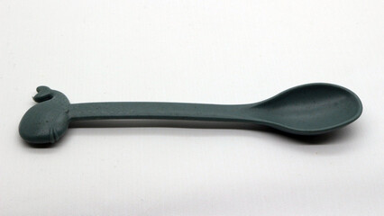 Plastic gray spoon isolated