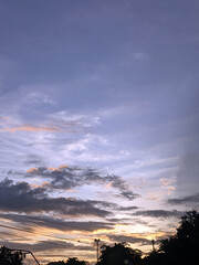 Beautiful view of clouds and sky in the afternoon with a hill in the background