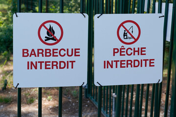 barbecue interdit panel and peche interdite sign french text means barbecue forbidden and fishing...