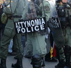 Policemen protect demonstration in a city