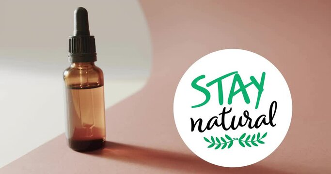 Animation of stay natural text and leaf logo over organic beauty oil dropper bottle