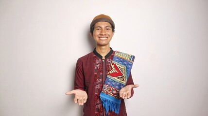 excited Asian Muslim man showing both hands