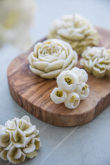 Decorative candles in the form of flowers