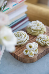 Decorative candles in the form of flowers