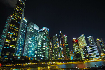 Singapore's Marina Bay nighttime skyline featuring the Marina Bay sands.