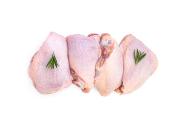 Raw chicken thigh with rosemary isolated on white background.