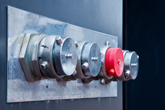 Auto sprinkler standpipe connector - Fire department connection outside of a building - Fire department connections for sprinkler systems and pump on the exterior wall in San Francisco