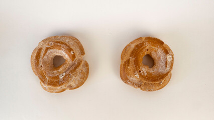 Two custard cakes top view on a white background