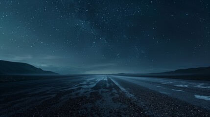 A solitary asphalt floor under the vast expanse of a starlit night sky. - obrazy, fototapety, plakaty