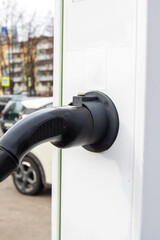 Electric Vehicle Charging Station at parking closeup