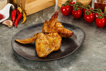 Tasty roasted chicken wing with spices