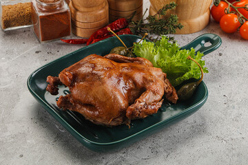 Baked small chicken with spices