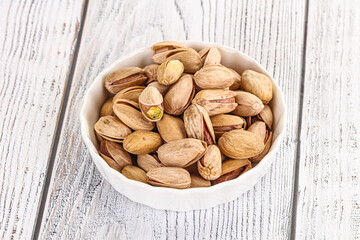 Salted tasty pistachio nuts heap