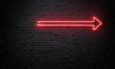 neon sign arrow on a dark brick wall - 752823854