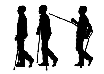 Young man on crutches is walking down the street. Isolated silhouettes on white background