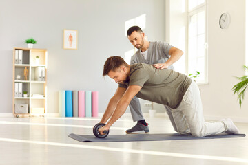 Rehabilitation corrective exercise to reduce chronic back pain, sport injury, joint health, fix...