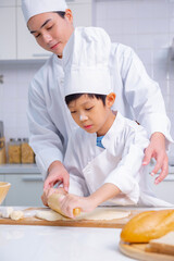 father and son cooking