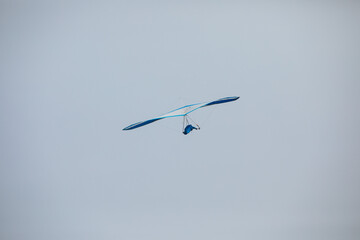 Flying in the sky. Hang glider in the air