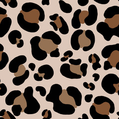 seamless leopard pattern on a beige background for textiles
