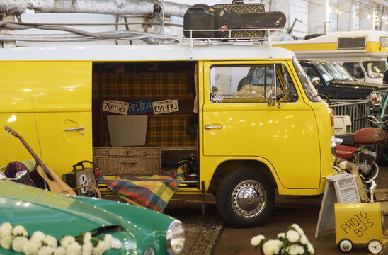 A VW Bus T1 classic car is parked at the exhibition.