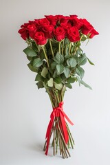 Fototapeta na wymiar A Collection of Red Roses Tied With a Ribbon