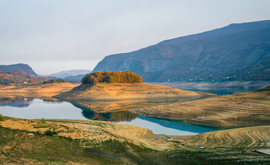 Beautiful Ramsko lake in the time of drought in Bosnia and Herzegovina. View of the amazing bosnian lake Ramsko jezero or Ramsko lahke in autumn with very little water.
