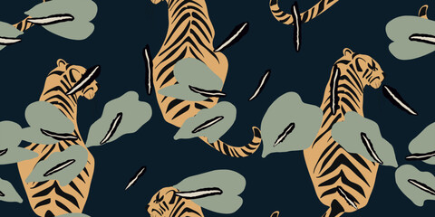 Tigers seamless pattern. Creative collage pattern. Fashionable template for design.
