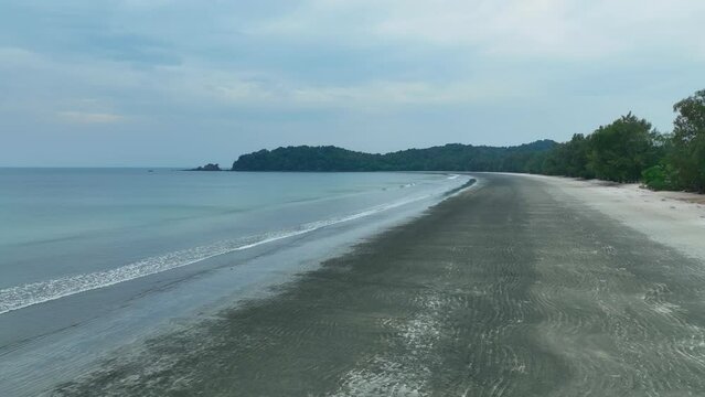 The coast of black sand bech in the island