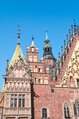 Fototapeta na wymiar Old Town Hall - Market Square Old Town Cityscape of Wroclaw, Poland in Sunshine, Blue Skies Sky in Spring - Gothic Architecture