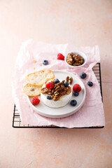 Baked camembert cheese with nuts and berries