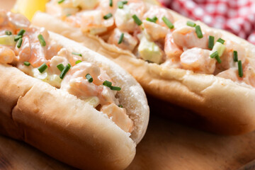 Lobster roll on wooden table. Close up