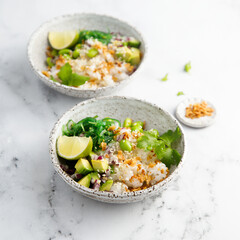 Healthy vegan poke with edamame beans and seaweed