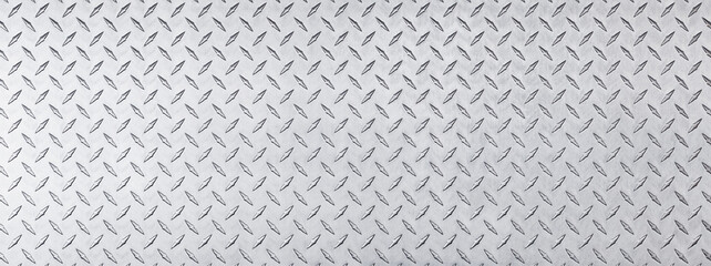 texture stainless steel with diamond pattern. light metal floor or wall background