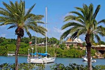 Virgin Islands, Caribbean. The ideal place to enjoy a peaceful vacation. Sailboats, villas and palm...