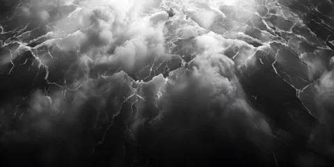 Fotobehang The dark clouds on sky before heavy rain storm. atmospheric black white blue,  © Muhammad