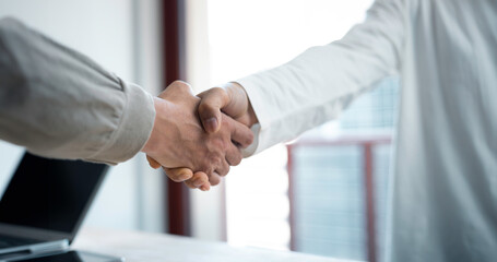 business deal agreement concept, handshake teamwork of business merger and acquisition, success negotiation, hand shake, businessman shaking hand with partner to celebrate partnership, multi exposure