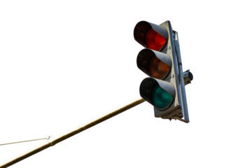 Red traffic light in the city isolated